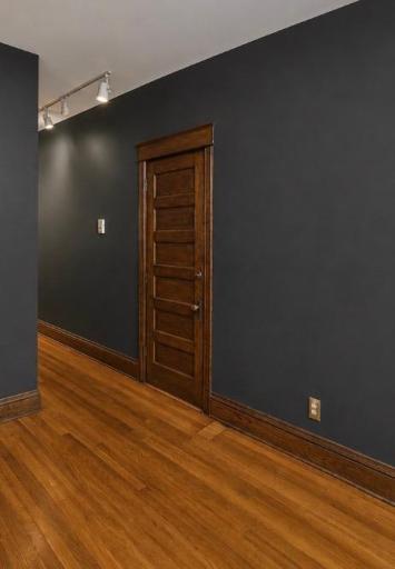 The millwork in the home is spectacular. Hardwood floors run throughout this historic home.