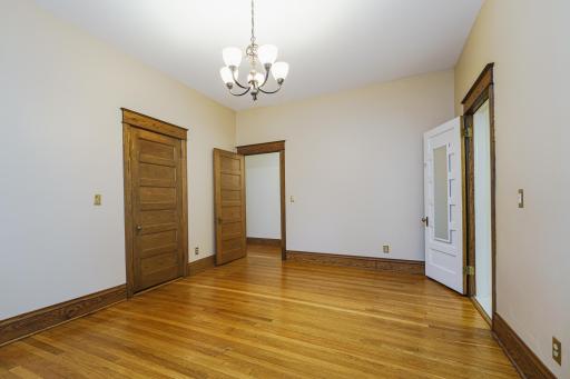 The primary bedroom walks-through to the full bathroom.