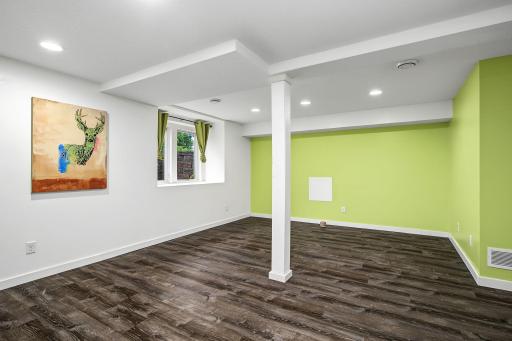 This large room shines with oversized egress windows allowing an legal 4th or 5th bedroom.