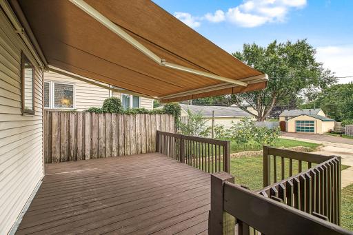 SunSetter awning is easy to use with a remote control. The also features a shade that comes down from the top of the awing and touches the floor of the deck for extra shade.
