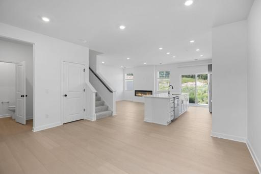 Sharing space with the kitchen, the modern dining area is great for serving piping-hot meals during intimate family dinners and holiday parties.