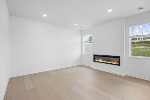 The natural gathering space of the home, the Great Room is excellent for hosting movie nights with loved ones, daily recreational activities and seamless relaxation, with an optional fireplace to add a warm charm.