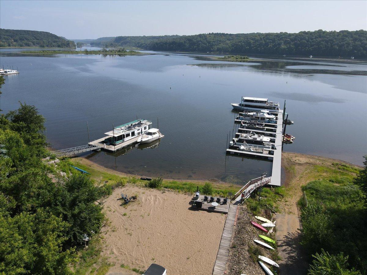 Private drive just a few steps up the street leads to private river lot...exclusive to 9 homes.