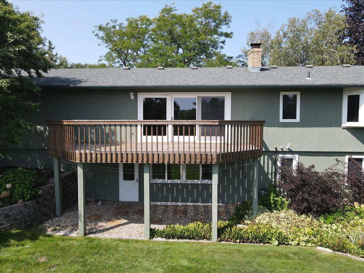 Nice sized rear deck offers river views. Walkout lower level offers a great space to create a more formal patio or screened porch.
