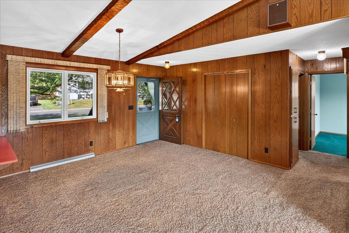 Cozy dining room is located to the front of the home. Entry closet is located just inside the door.
