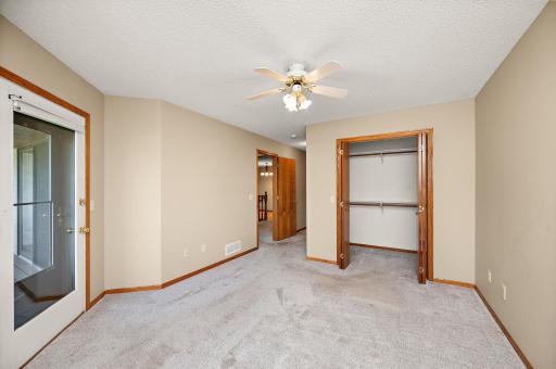Standing in bedroom and around the corner is private bath