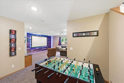 Versatile entertainment area perfect for movies, games or gatherings.