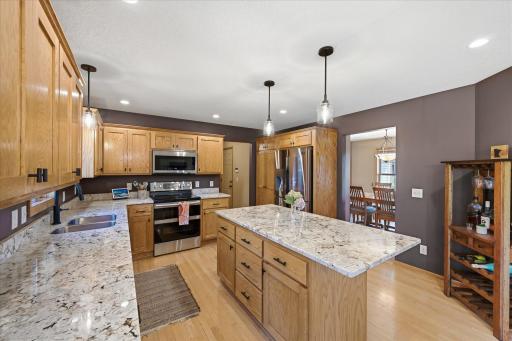 Abundant cabinetry provides excellent storage for kitchen essentials.