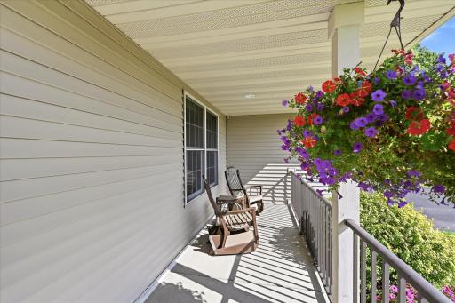 Cozy front porch to enjoy your morning coffee on.