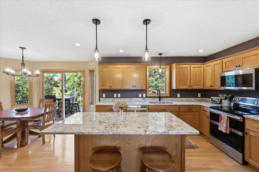 Spacious island provides additional prep space and seating.