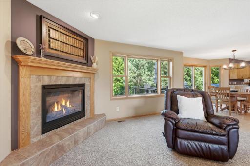 Gas fireplace adds warmth and charm to the living space.