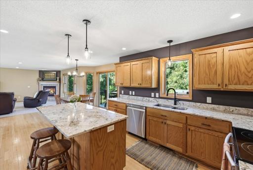 Kitchen opens to main living spaces for effortless entertaining.