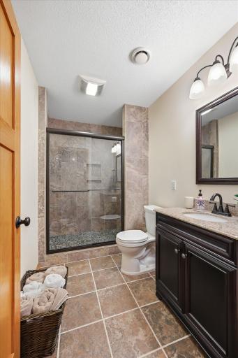 Spacious shower offers a clean and contemporary feel.