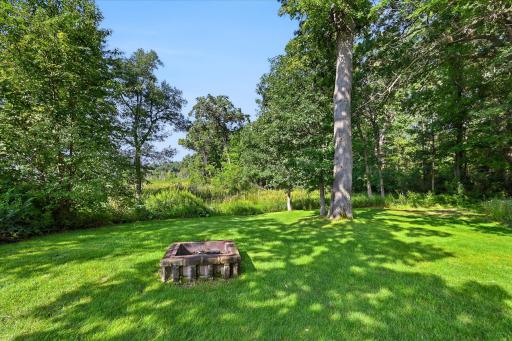 Serene backyard offers the perfect place to relax and unwind.