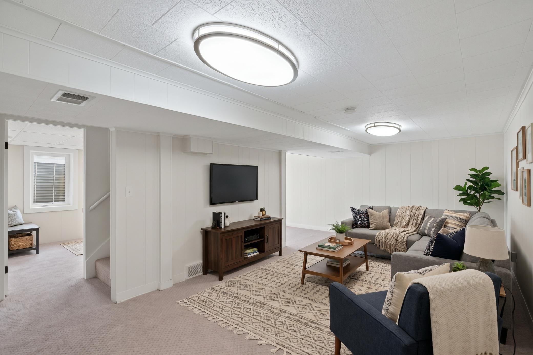 Lower level: family room (virtually staged)