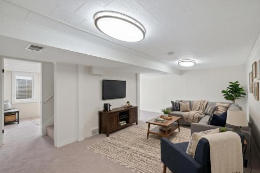 Lower level: family room (virtually staged)