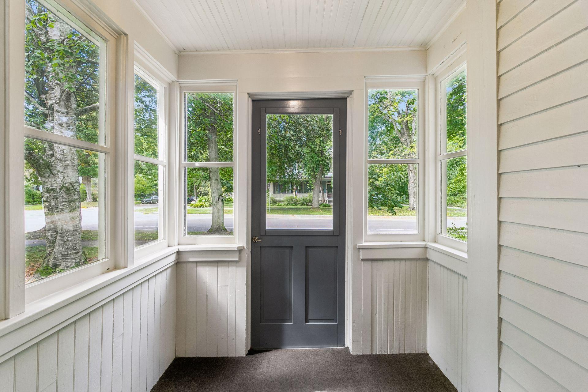 Front porch with tongue & groove wainscoting & ceiling