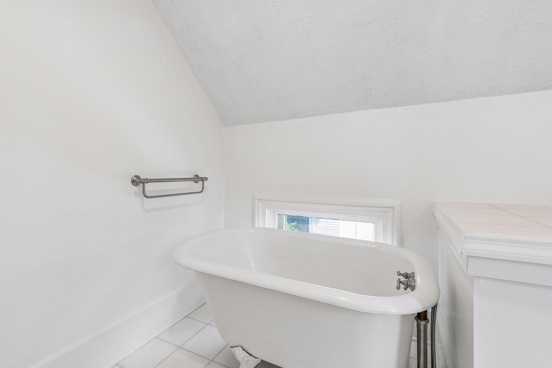 Upper level bathroom with claw foot tub