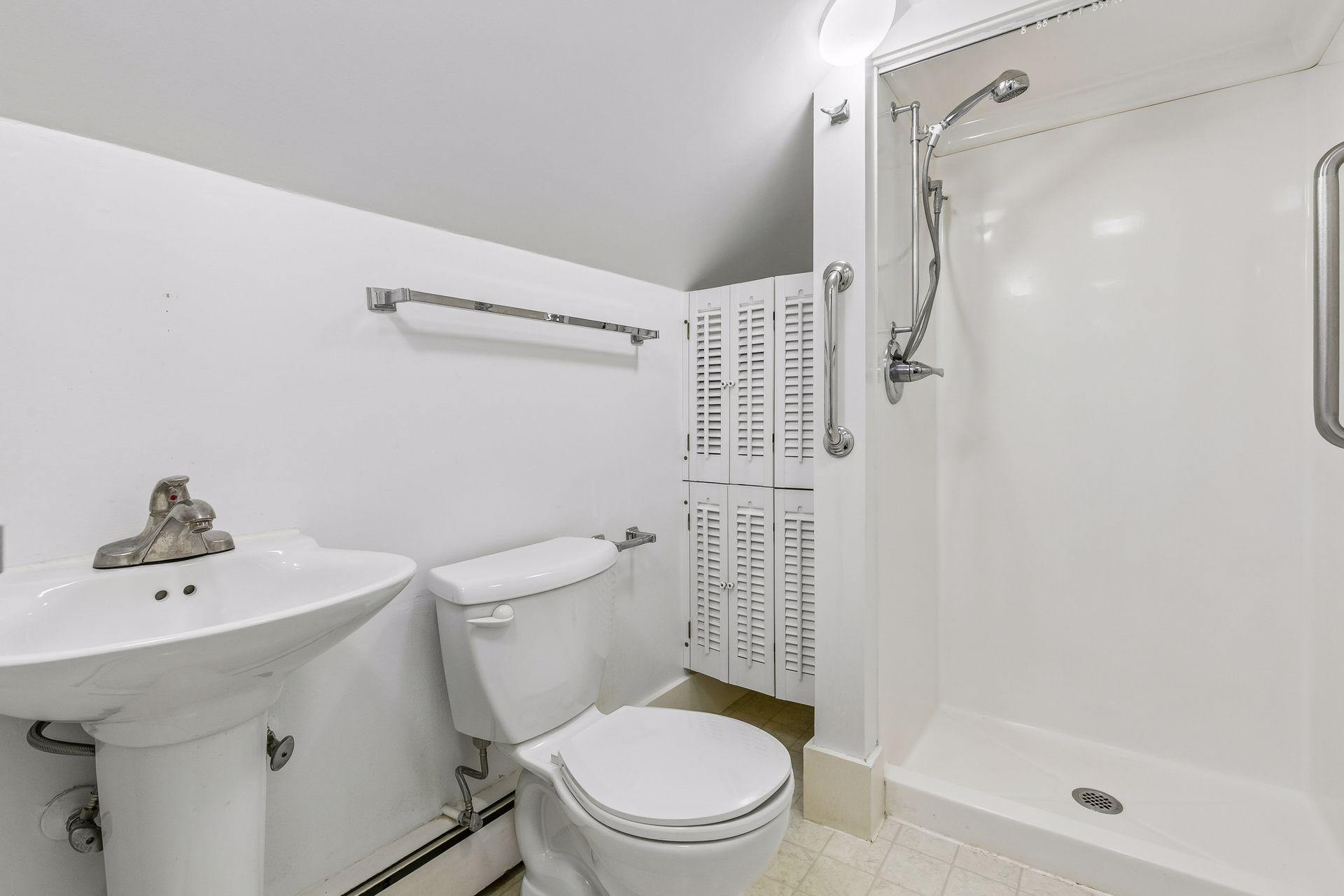Upper level bathroom with shower
