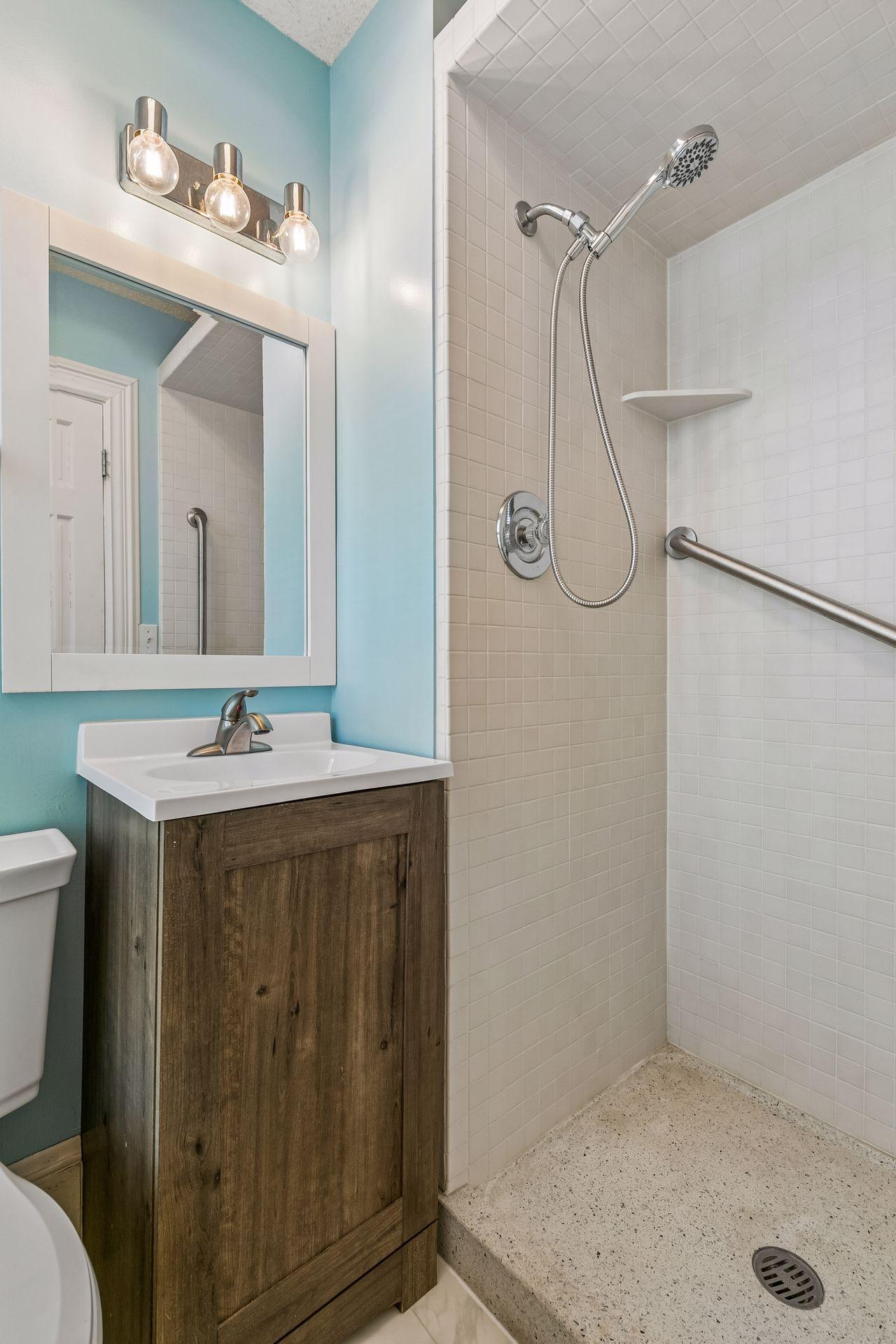 3/4 main floor bath with ceramic tiles