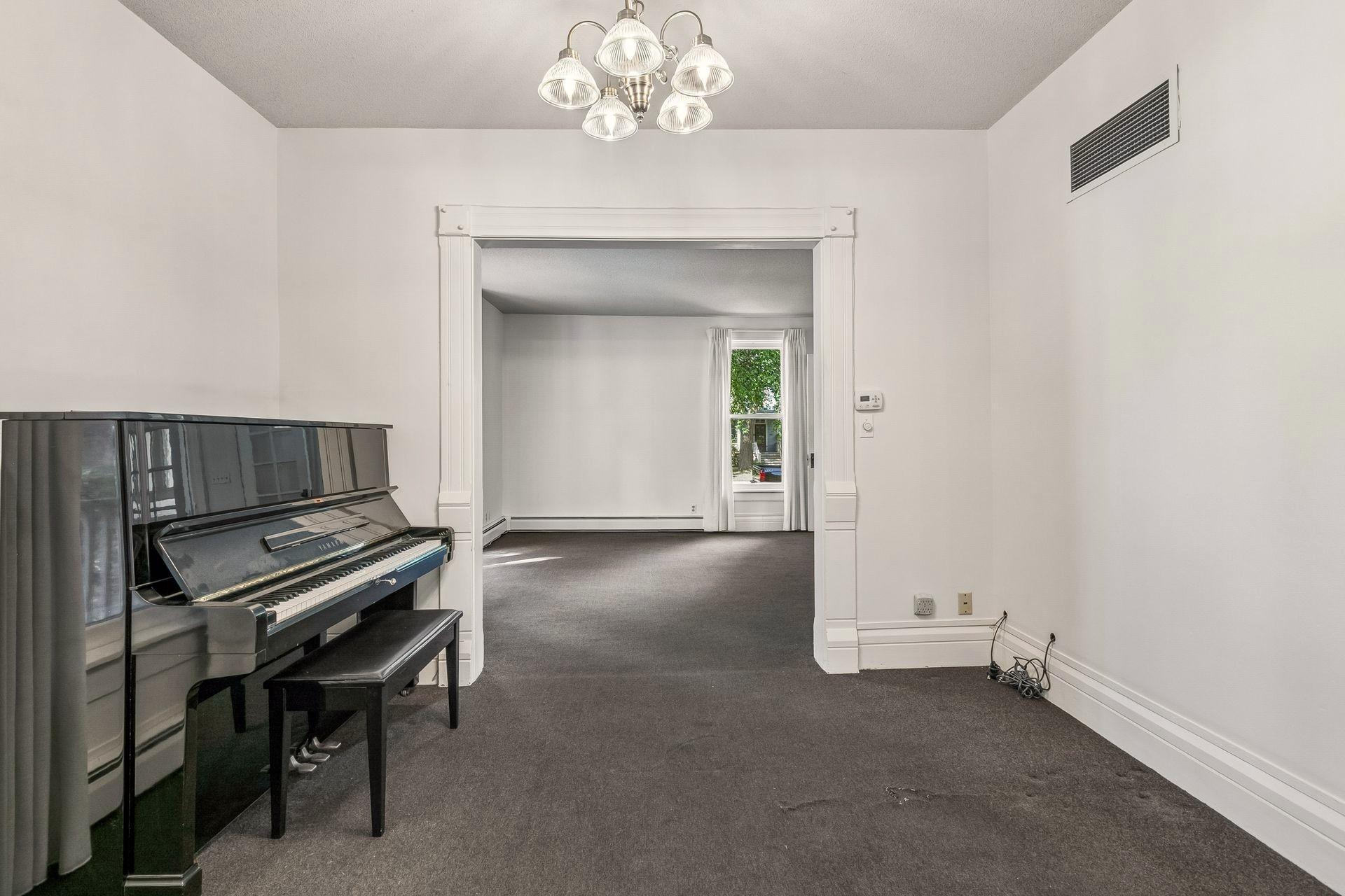 This room could be a library, sitting room, music room