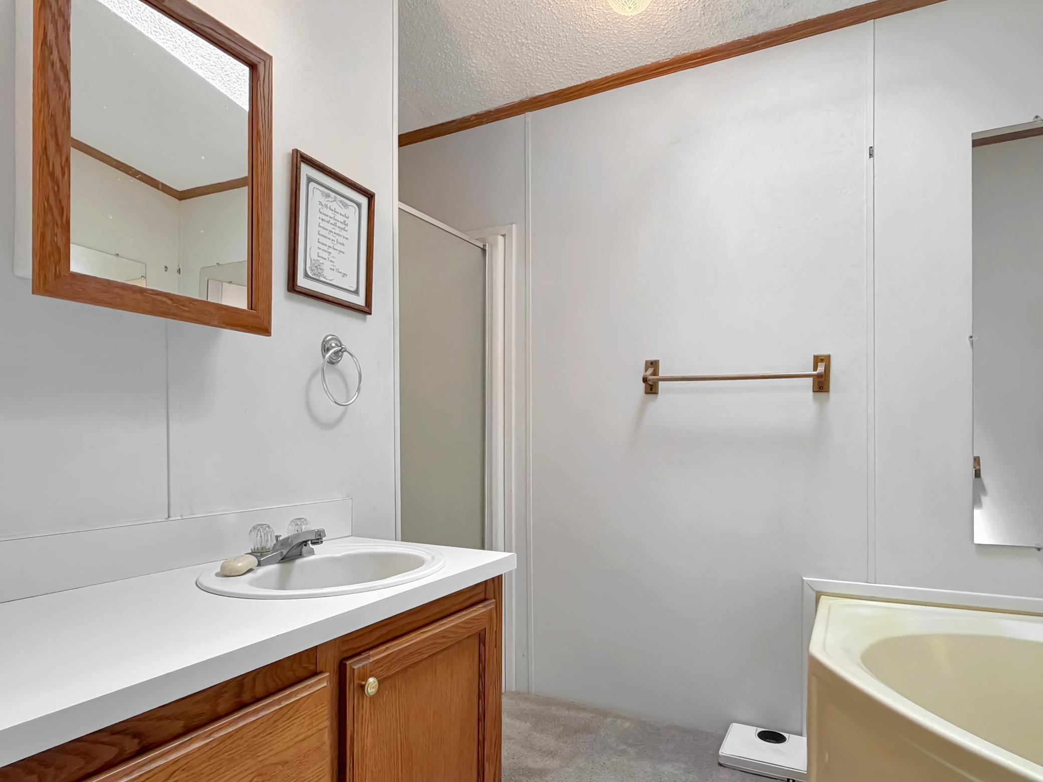 Master bath with shower & jacuzzi tub