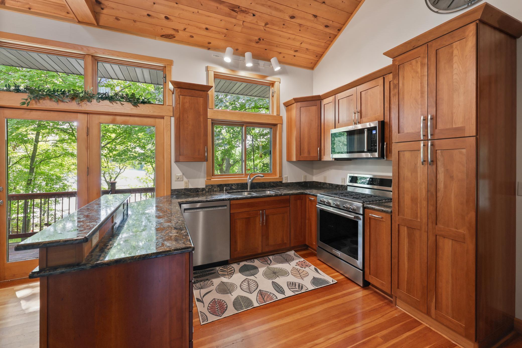 Cherry cabinetry with granite tops