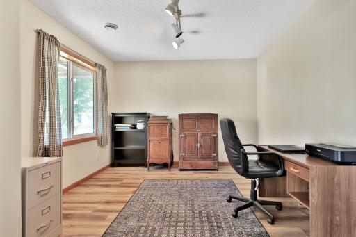 Office with windows to back yard, could make for a 6th bedroom if required.