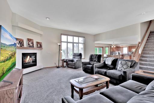 Floor to Ceiling windows to allow natural light to the living room. Gas FP for winter evenings.