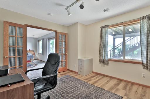 Lower level den with French doors to family room.