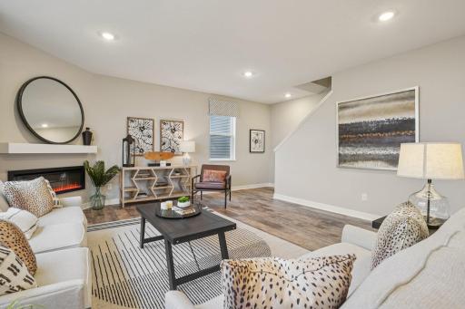 Another view of the spacious main floor family room. (Photos of model. Colors and finishes may vary).