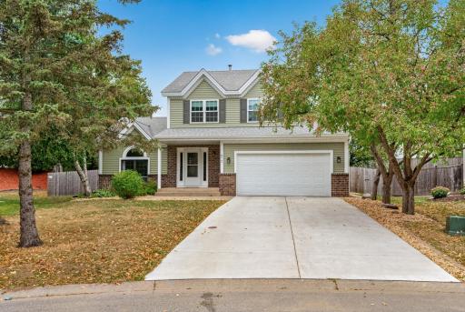 Beautiful new fully cement driveway with new windows, garage door, siding, and gutters!