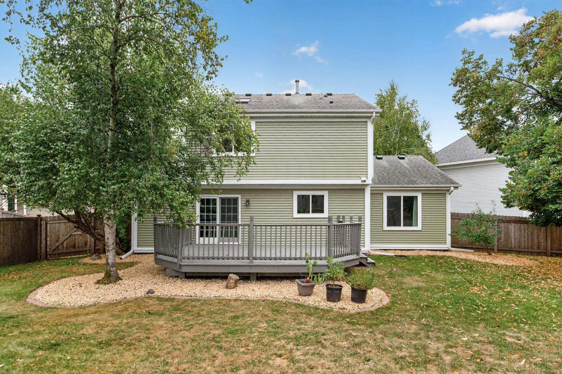 Fresh landscaping and a freshly painted deck - great for entertaining and enjoying the backyard!