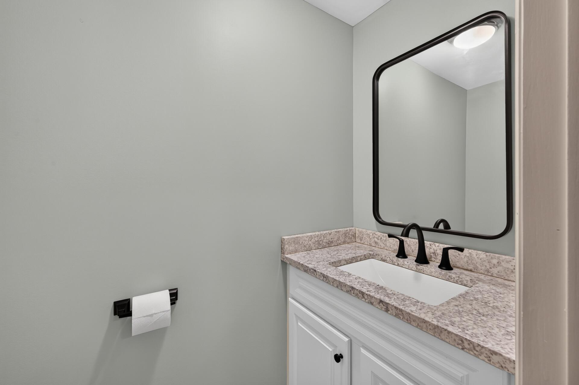 Lower level half bathroom