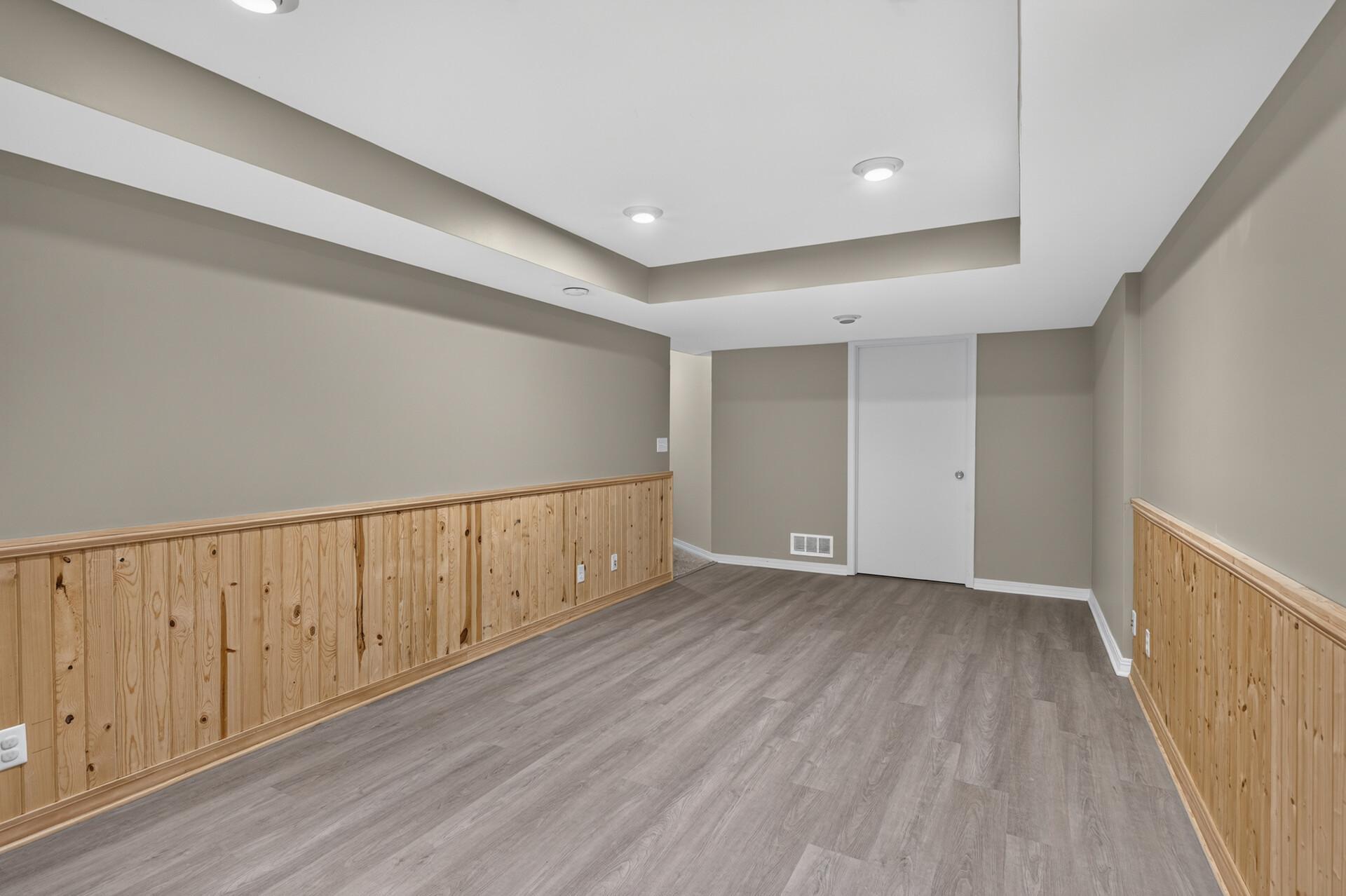 Lower level family room or this can be transformed into another bedroom space, or workout space! So many options!