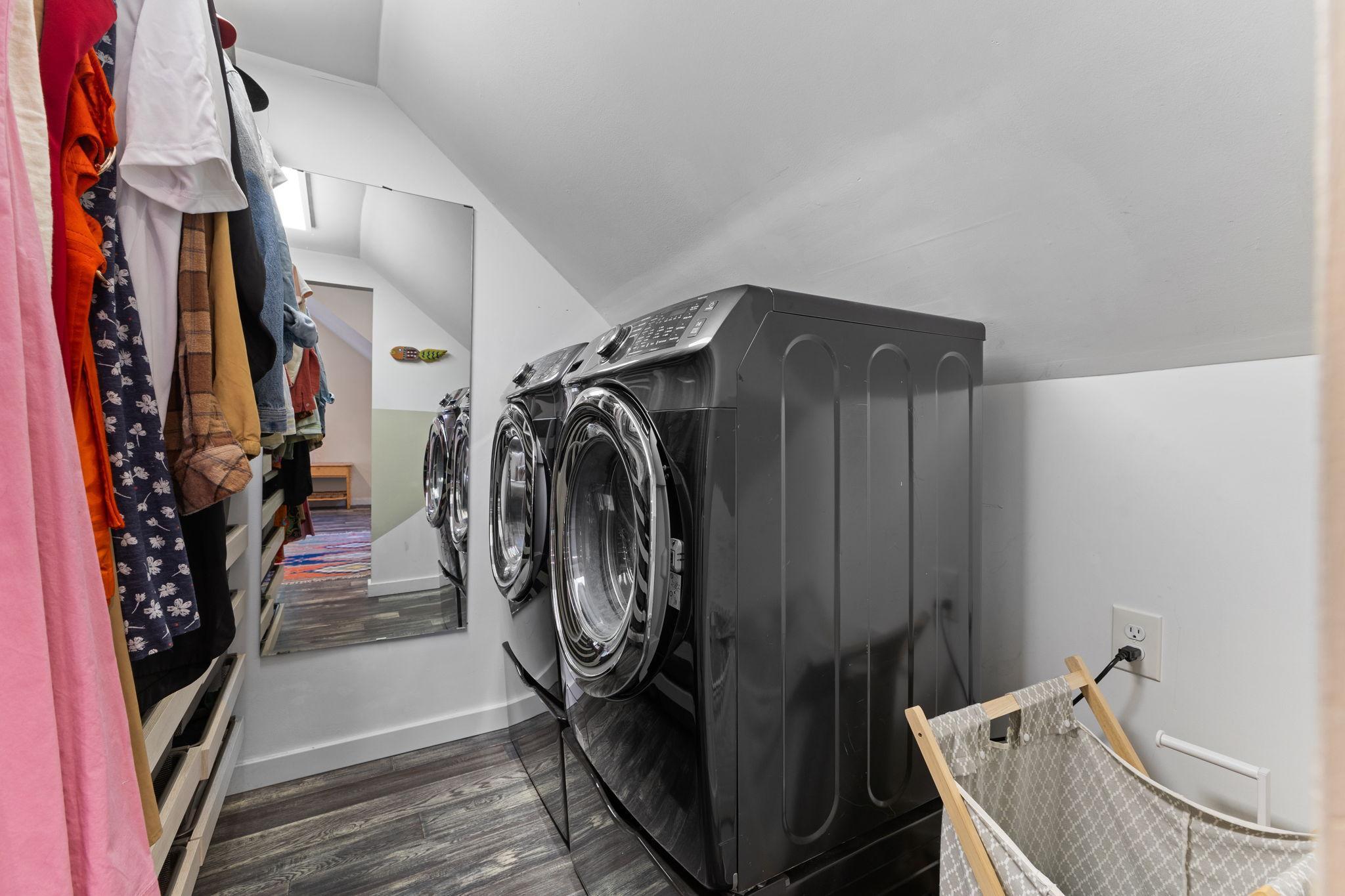 Upper Level Owners Suite- walk-in closet with laundry