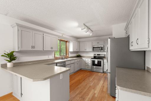 Large kitchen with breakfast bar