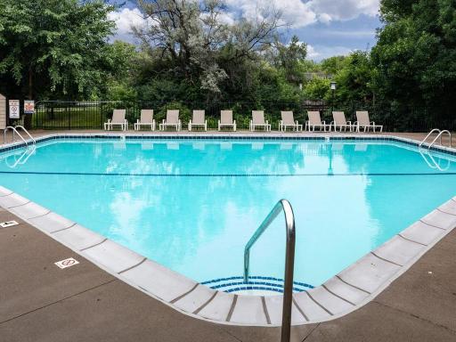 Residents can enjoy the community outdoor pool surrounded by mature trees and landscaped grounds along with a sauna and grilling area.