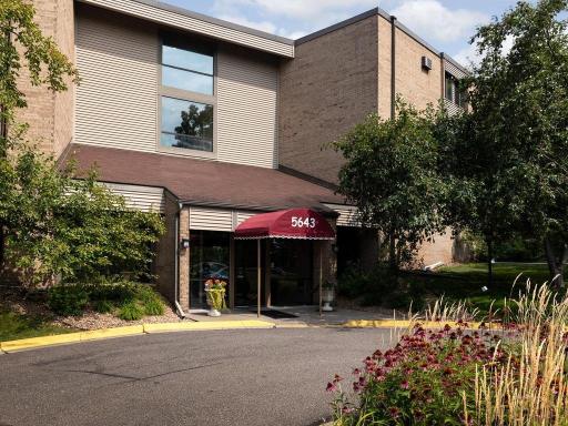 Established Minnetonka condo community features maintained grounds and convenient access to shopping, dining, trails, and highways.