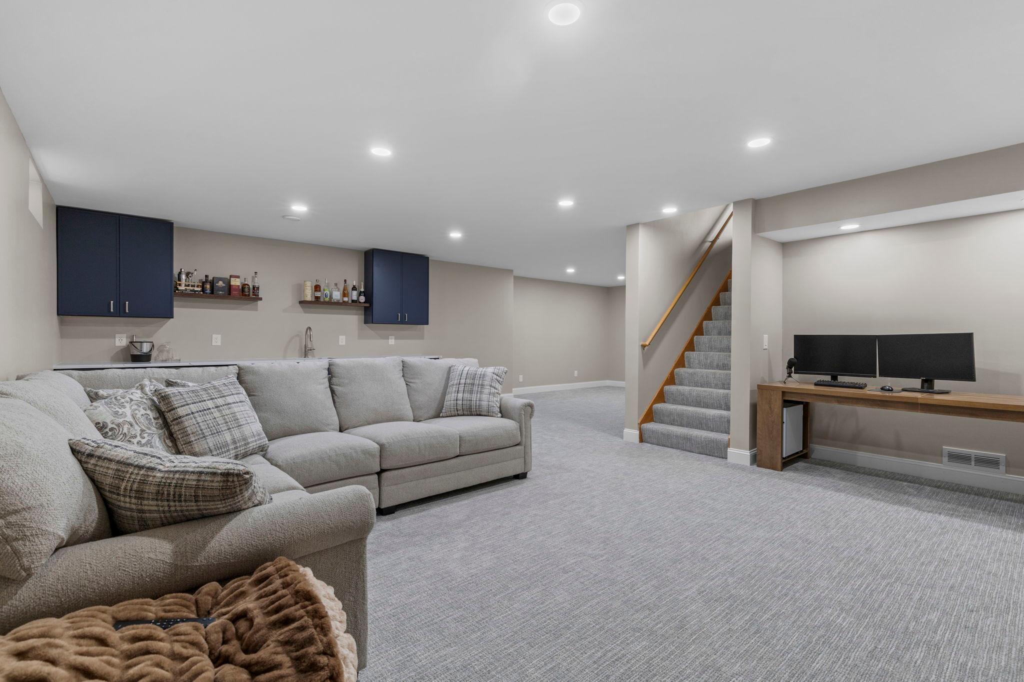 The newly finished lower level adds an incredible amount of living space, with a large family room perfect for movie nights, entertaining, and relaxing