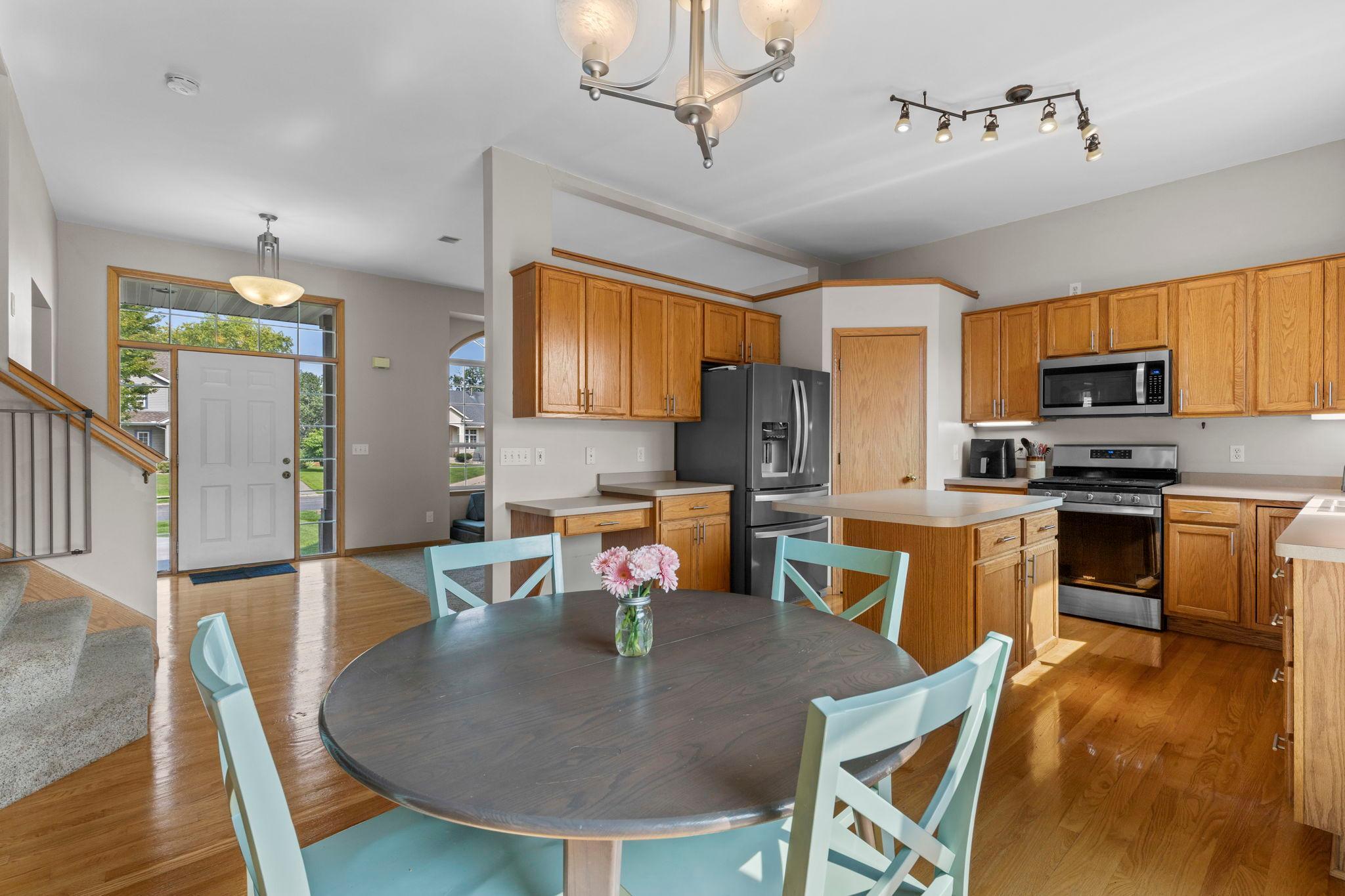 The open layout creates a natural flow from the front living room toward the kitchen and dining areas