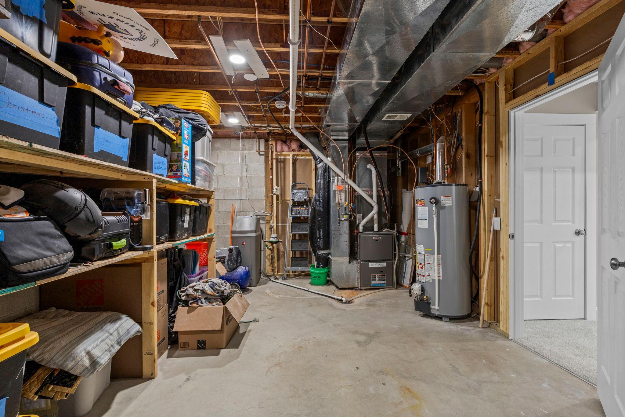 Plenty of additional unfinished storage and utility space tucked away in the lower level