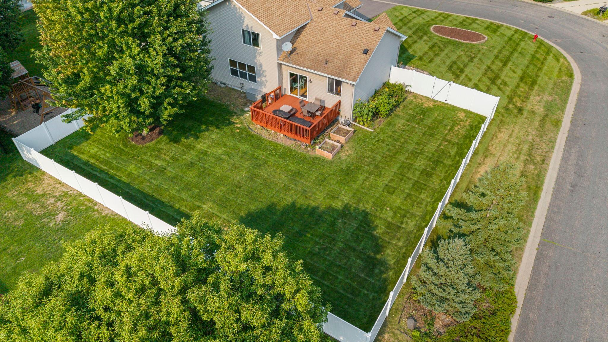 A bird’s-eye view really shows off the generous fenced backyard and corner lot, with plenty of usable green space