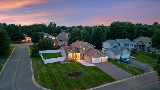 Photo for 14974 Hillside Trail, Savage, MN 55378 - listing #7122450 Welcome home to 14974 Hillside Trail! A beautiful aerial view highlighting the home’s generous corner lot, new driveway, fresh front landscaping, and fully fenced backyard
