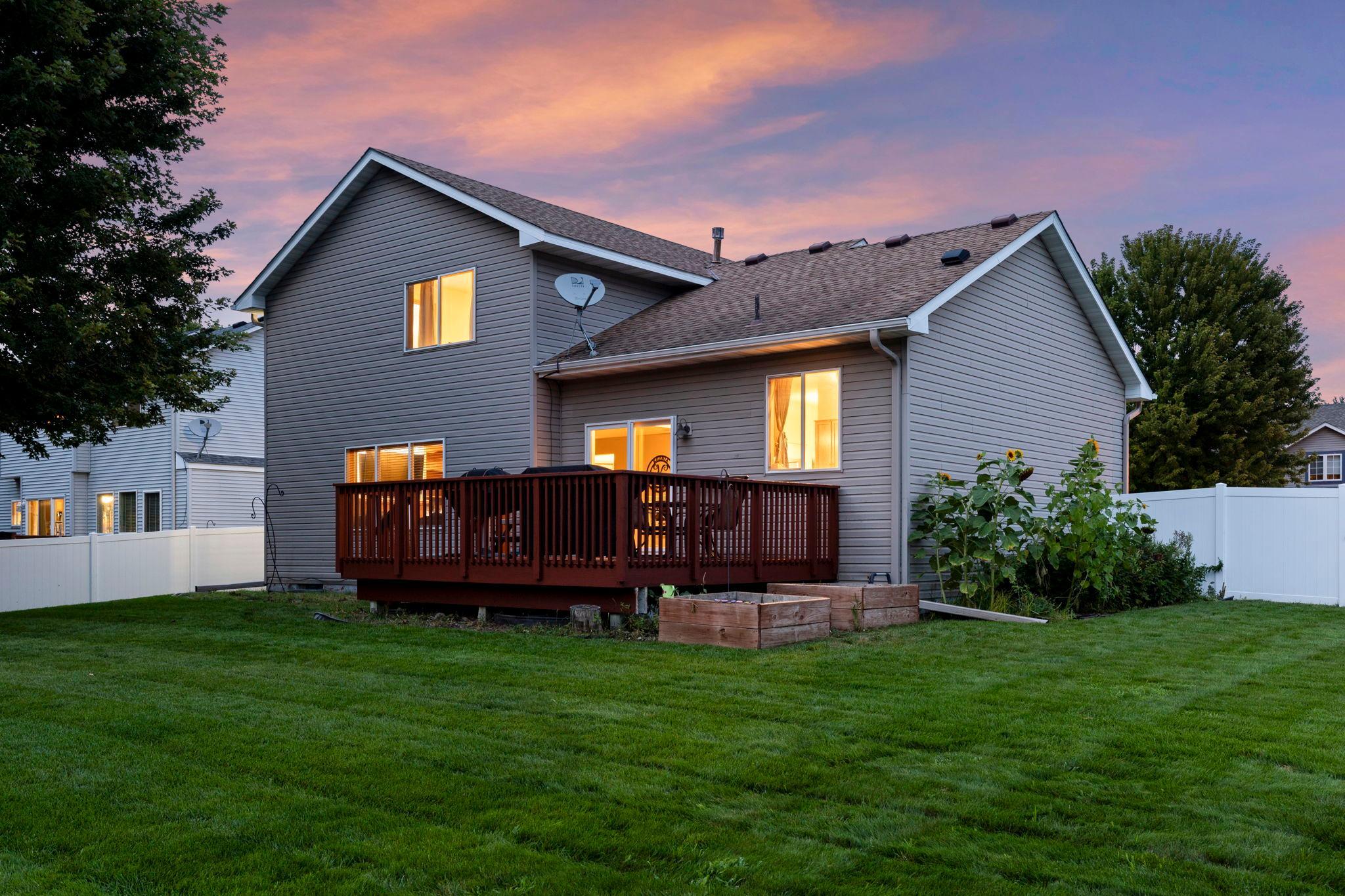 A beautiful evening view of the home and deck—an inviting place to unwind at the end of the day