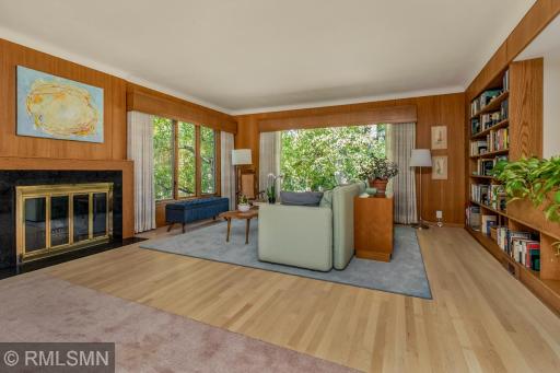 Wood burning fireplace with granite surround.