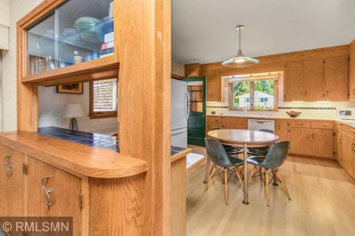 The dining room is adjacent to the spacious kitchen.