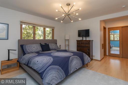 There are two large closets and a private 3/4 bath. New maple floors!