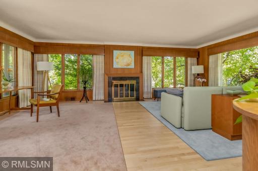 Flooded with natural light and surrounded by nature.
