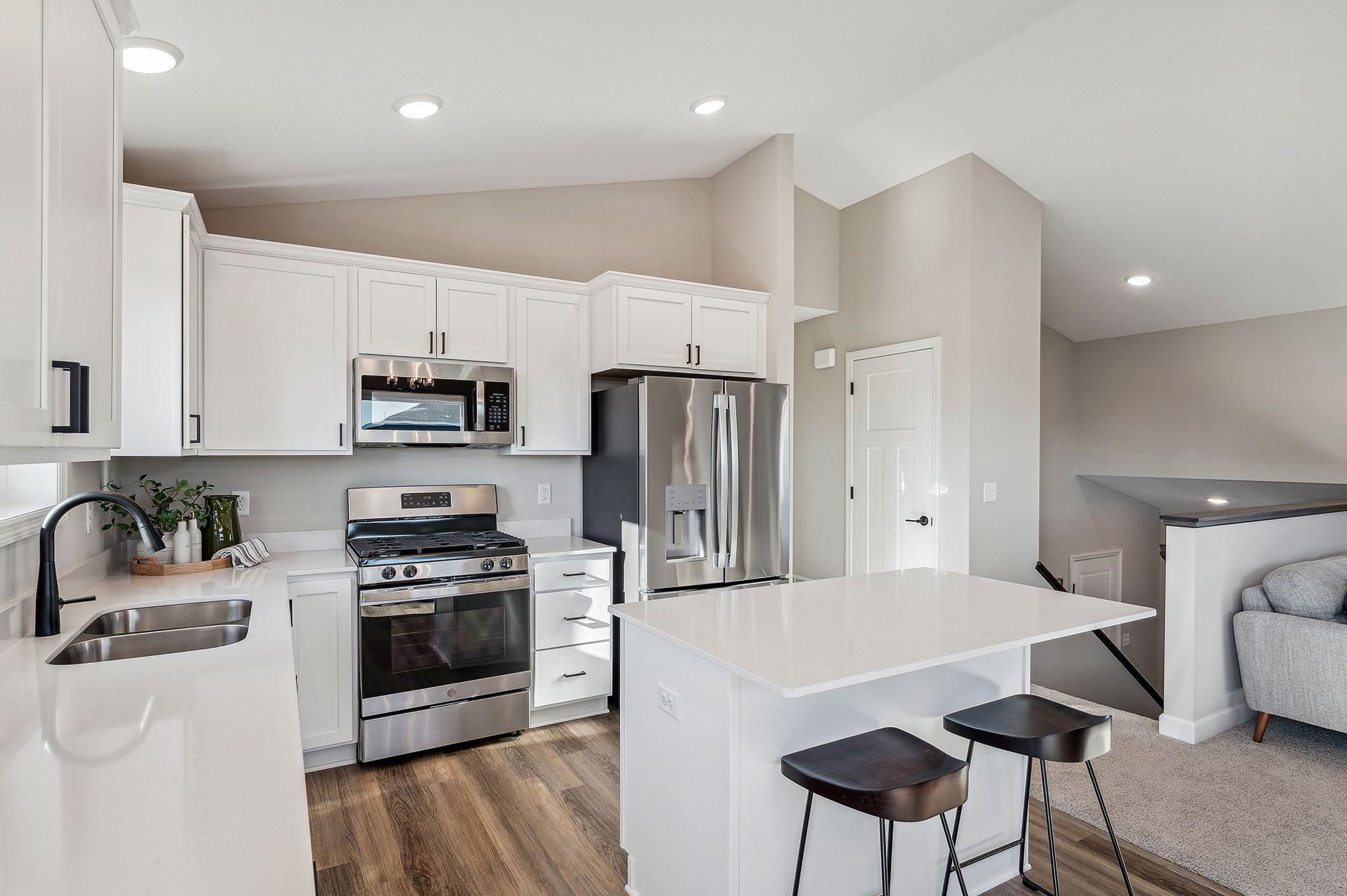 Kitchen - photo of a staged model home of the same floorplan. Selections may be different.